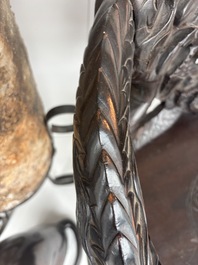 A pair of Japanese carved wooden 'dragon' chairs, Meiji, 19th/20th C.