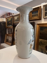 Two Chinese famille rose vases with ladies and children in a palace garden, 19th/20th C.