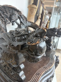 A pair of Japanese carved wooden 'dragon' chairs, Meiji, 19th/20th C.