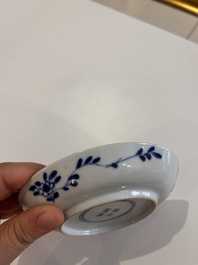 A varied collection of Chinese blue and white porcelain with figures and floral design, 18th/19th C.