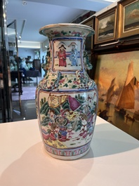 Three Chinese Canton famille rose 'warrior and palace scenes' vases, 19th C.