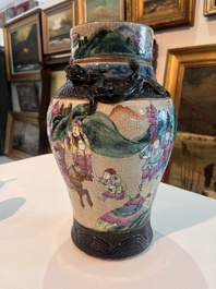 A Chinese Nanking crackle glazed famille rose 'warrior' vase and cover, a tea caddy and an Imari style teapot and cover, 18th/19th C.