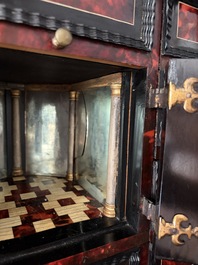 An ebonized wooden and tortoiseshell-veneered Antwerp cabinet on stand, 17th C. and later
