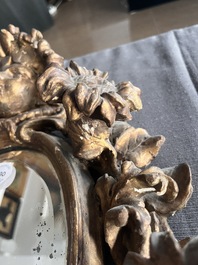 A pair of French gilt and carved wooden 'sunflower' mirrors, 18th C.