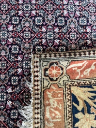 A Persian Kashan (Keshan) Mohtashem rug with Shirin and Khosrow, wool on cotton, late 19th C.