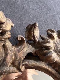 A pair of French gilt and carved wooden 'sunflower' mirrors, 18th C.