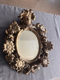 A pair of French gilt and carved wooden 'sunflower' mirrors, 18th C.