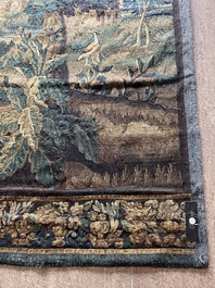 A Flemish wall tapestry with birds in a landscape with a castle in the background, 17th C.