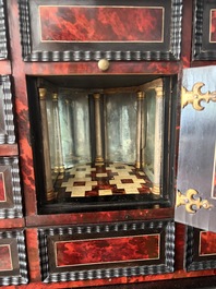 An ebonized wooden and tortoiseshell-veneered Antwerp cabinet on stand, 17th C. and later