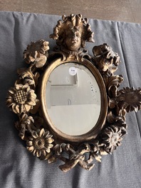 A pair of French gilt and carved wooden 'sunflower' mirrors, 18th C.