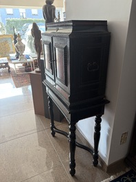 An ebonized wooden and tortoiseshell-veneered Antwerp cabinet on stand, 17th C. and later