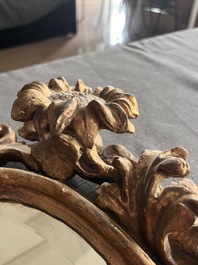A pair of French gilt and carved wooden 'sunflower' mirrors, 18th C.