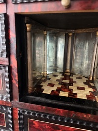 An ebonized wooden and tortoiseshell-veneered Antwerp cabinet on stand, 17th C. and later