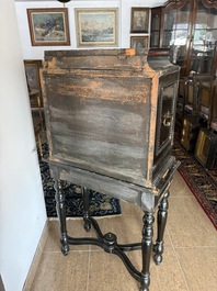 An ebonized wooden and tortoiseshell-veneered Antwerp cabinet on stand, 17th C. and later