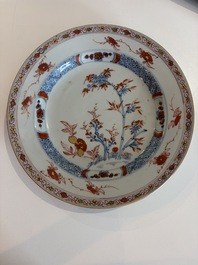 Eleven Chinese Imari style and famille rose plates with floral design, Yongzheng/Qianlong