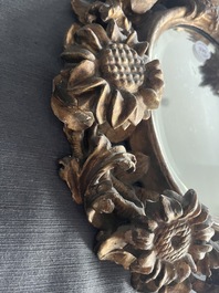 A pair of French gilt and carved wooden 'sunflower' mirrors, 18th C.
