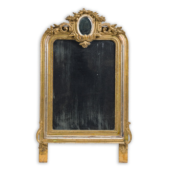 A French Louis XVI style gilt and silver-plated mirror with floral design, 19th C.