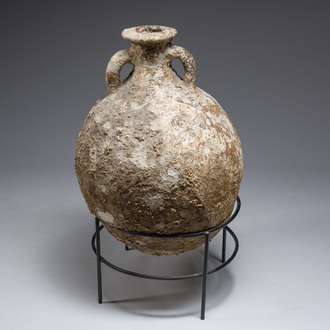 A large Roman rounded terracotta oil amphora of the 'Dressel 20' type, 1st-3rd C.