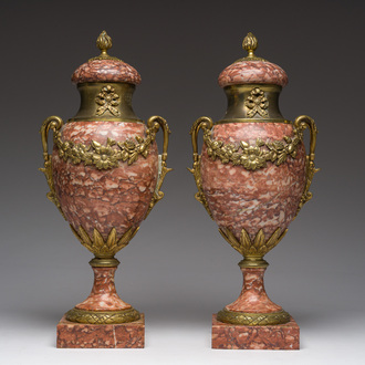 A pair of gilt bronze mounted red marble cassolettes, 19th/20th C.