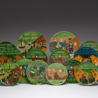 Een collectie van 18 Torhouts aardewerken spreukschotels, 20ste eeuw