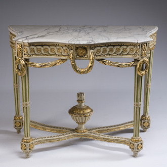 A parcel-gilt and polychromed wooden marble-topped console table in Louis XVI style, 19th C.