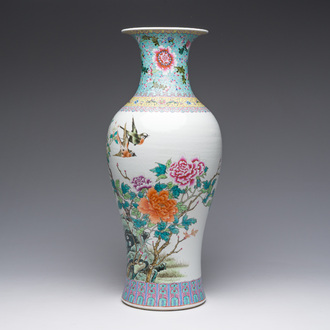 A Chinese famille rose baluster vase with birds among blossoming branches, Qianlong mark, Republic, 20th C.
