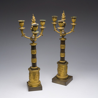 A pair of French Empire gilt and patinated bronze three-light candelabre, 19th C.