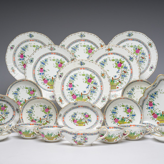 A large Hungarian Herend gilt and polychrome decorated porcelain set with floral design, 20th C.