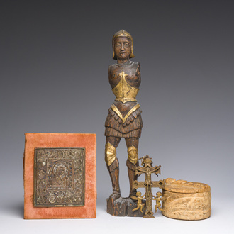 A Flemish parcel-gilt wooden 'soldier', a double-sided bronze cross, a Russian orthodox travel icon and a carved stone box and cover, 16th C. onwards