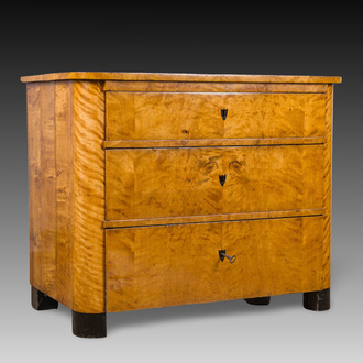 A Biedermeier pine chest of drawers with shellac-polished veneer, 19th C.