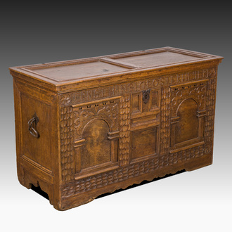 An inscribed German oak chest with two arches, 18th C.