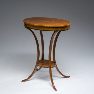 Jean-Joseph Chapuis (1765-1864): A brass inlaid wooden gueridon on four curved supports, first quarter 19th C.