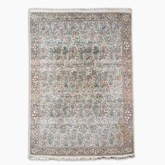 An Indian silk Kashmir rug with floral design, 20th C.