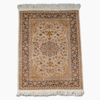 A Sino-Tabriz silk rug with floral design, 20th C.