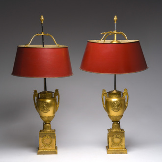 A pair of Empire style gilt bronze urns mounted as lamps, France, 19th C.
