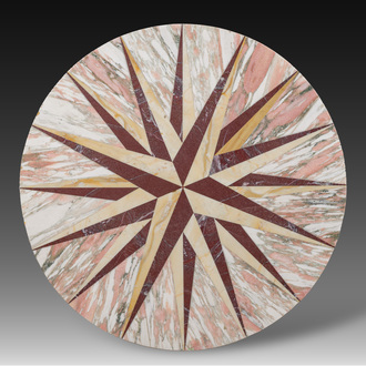 A round Italian pietra dura table top with a sixteen-pointed star, 20th C.