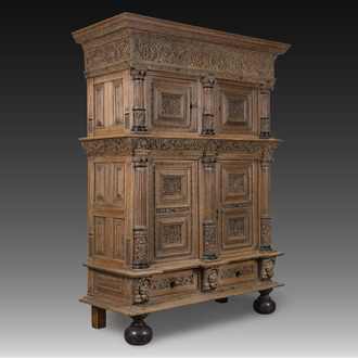 A Dutch elaborate carved oak Renaissance four-door cupboard, 17th C.
