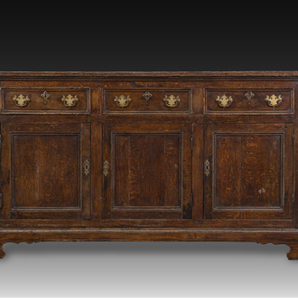 A sideboard with three doors and three drawers, late 18th C.