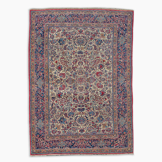 A Persian Isfahan rug with floral design, wool on silk, first half 20th C.