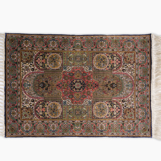 An extremely fine Chinese Hereke style silk rug with floral design, 20th C.
