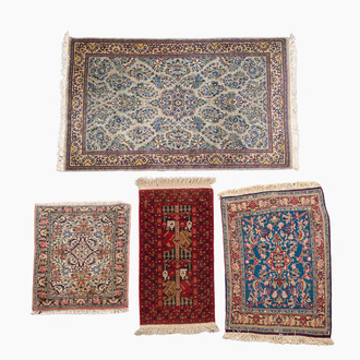 Four oriental rugs (Sarouk, Hamadan and an Afghan carpet), wool on cotton, 20th C.