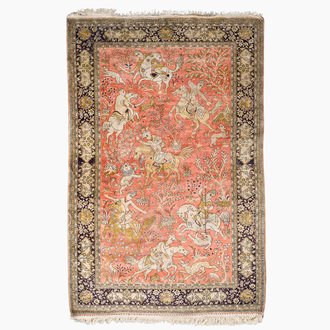A Persian Qom (Qum/Ghom) silk rug with hunting scenes, 20th C.