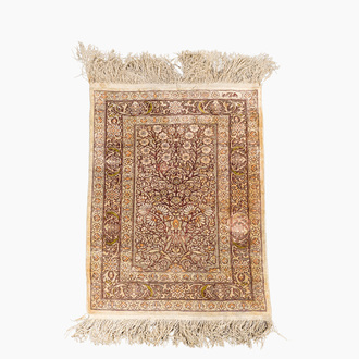 A Turkish Hereke silk rug with gold threads and floral design, 20th C.