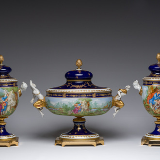 An Italian polychrome and partly gilt three-piece Sèvres style garniture set with landscapes and romantic scenes, Giulia Mangani, 20th C.