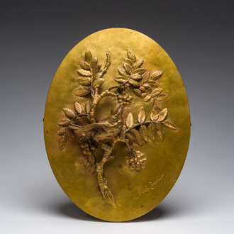 Paul Comolera (1813-1890): Plaque à décor en relief d'un oiseau sur une branche fleurie, bronze doré
