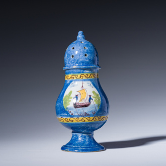 A polychrome Brussels faience caster with an animated river landscape, 18th C.