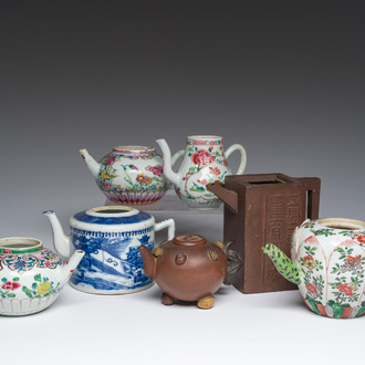 Seven Chinese blue, white, famille rose, verte and Yixing stoneware teapots, Kangxi and later