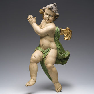 A large German gilt and polychrome decorated limewooden angel, 18th C.