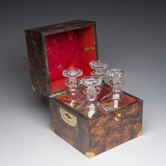 A French burl wooden veneered and brass-inlaid 'cave à liqueur' with four glass carafes, 19th C.