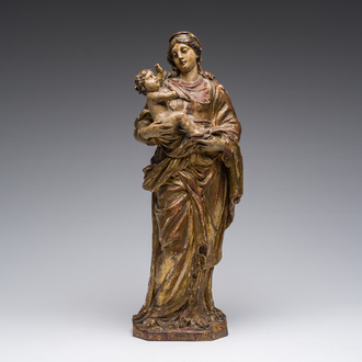 An Italian carved, polychrome decorated and gilt wooden Madonna and Child, 17th/18th C.